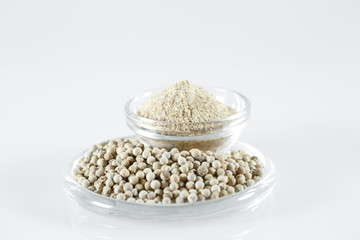 Ground White Pepper Isolated in white.