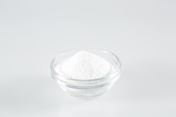 Lemon acid and lemon fruits on the white background