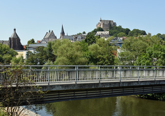 Fototapeta na wymiar View to the castle of Marburg/Lahn, Germany, with a bridge in the foreground