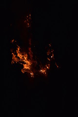 Burning of rice straw at night.