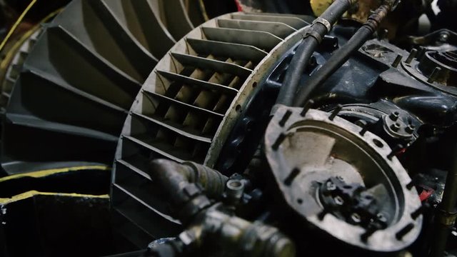 4K Close up footage running along an old Airplane Engine footage from a turboprop aircraft. Showing the details of the old aircraft that's now out of service.