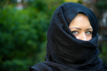 Beautiful blue eyed muslim lady posing with scarf on her head