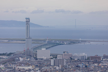 Tower rises over the bridge leading to Kansai International Airport