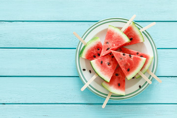Watermelon slice popsicles, blank food background with space for a text, top view
