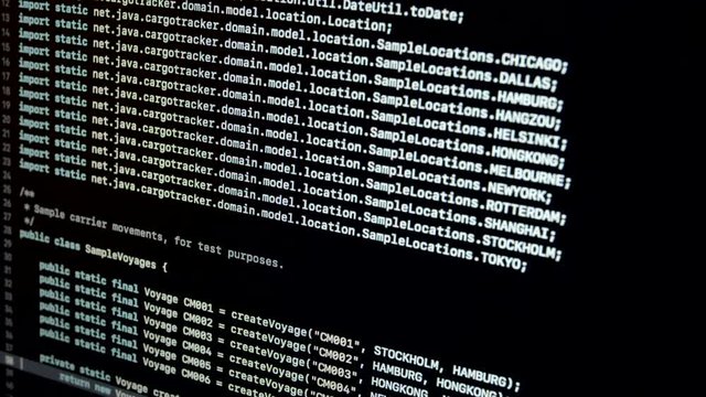 Code 2.5 Scrolling Java Code By Developer on Notebook screen