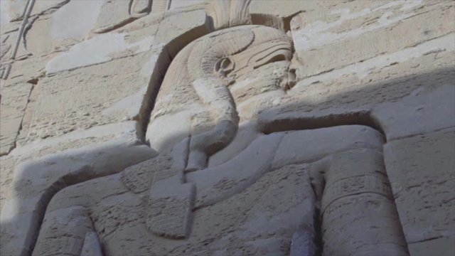 Ancient Egyptian wall carving reliefs at Temple of Kom Ombo, closeup