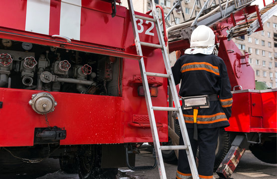  red fire truck with a ladder.