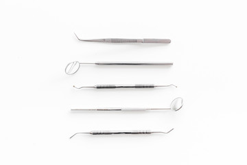 dentist desk with instruments on white background top view