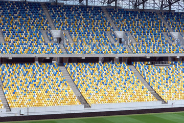 fragment of empty stadium soccer field © Vitaliy Hrabar