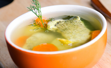 Fish soup served on the table in plate