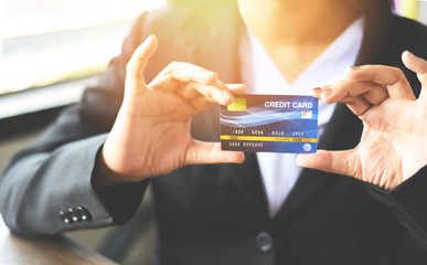 Woman hands holding credit card for online shopping in a office - working people paying technology money wallet online payment , Credit card mockup