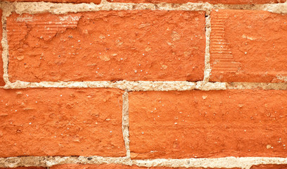 Red brick weathered wall element / horizontal detail.