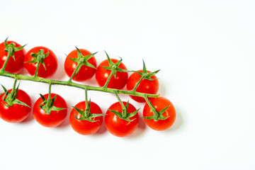 Fresh cherry tomatoes isolated on white background. 
