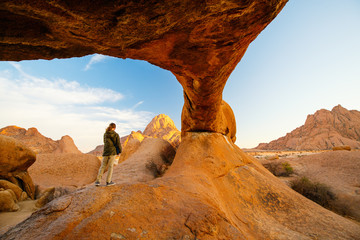 Young girl hiking in Spitzkoppe Namibia