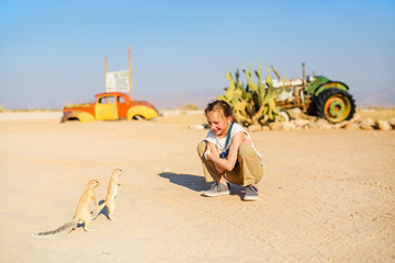 Young girl and ground squirrels