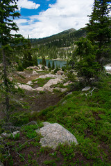 Hiking boots with trail in the background - Vacation Motif