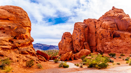 The Seven Sisters, a bright red Aztec sandstone rock formation in the Valley of Fire State Park in...