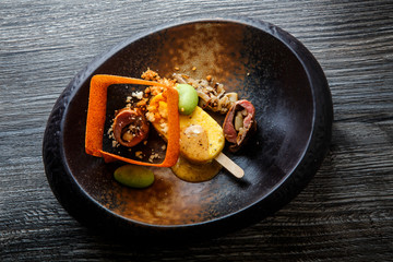 top view on restaurant fish dish with exclusive garnish