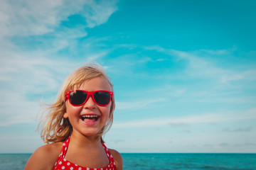 happy cute smiling girl at summer beach