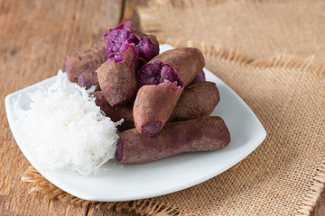 Steamed purple sweet potato in white plate