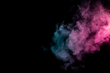 Colored background with winding clouds of smoke from patterns of different forms of pink, green and...