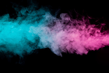 Colored background with winding clouds of smoke from patterns of different forms of pink, green and...