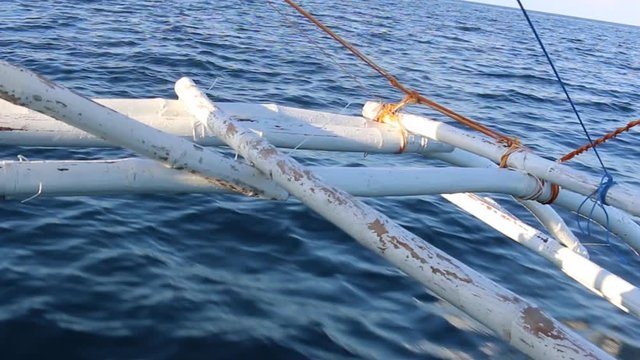 Beautiful blue water off a small island in the Philippines while riding on an iconic Baroto boat