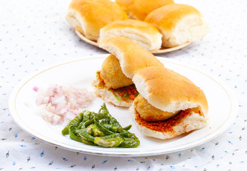 Indian Famous Street Food Vada Pav Also Know as Vada Paav, Wada Pav or Wada Pao is a Vegetarian Fast Food Dish From Maharashtra