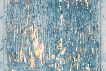 A background of rustic weathered wood and peeling paint