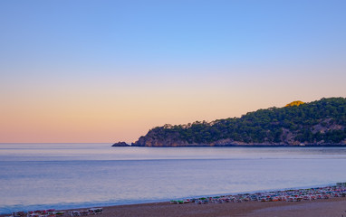 Oludeniz, Turkey. Panorama of the Mediterranean Sea at dawn in the sun.