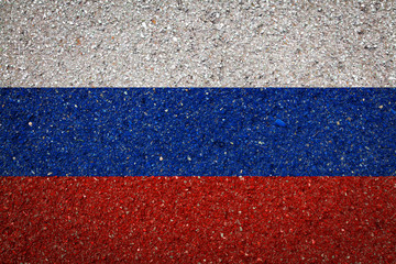 National flag of Russia on a stone background.The concept of national pride and symbol of the country.