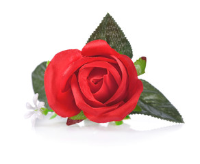 Artificial red rose isolated on white background.
