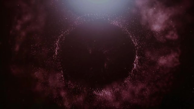 Purple Glittering particles sparkle and drift along on a soft current