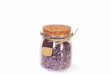 Dried lavender flowers in bottle for aroma, cosmetics,gift,craft,healthcare therapy concept in white background 