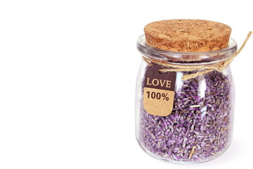 Dried lavender flowers in bottle for aroma, cosmetics,gift,craft,healthcare therapy concept in white background 