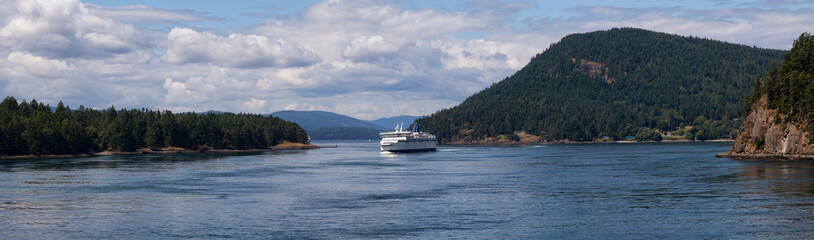 Fototapeta na wymiar Beautiful Panoramic View of a Ferry Boat passing in the Gulf Islands Narrows during a sunny summer day. Taken near Vancouver Island, British Columbia, Canada.