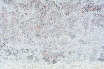 Texture of polished granite stone floor with white dense mud like chalk or lime