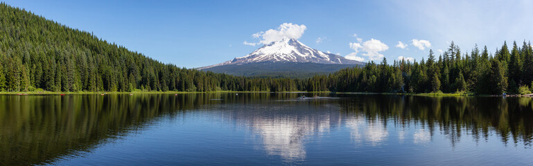 Beautiful Panoramic Landscape View of a Lake with Mt Hood in the background during a sunny summer day. Taken from Trillium Lake, Mt. Hood National Forest, Oregon, United States of America. - obrazy, fototapety, plakaty
