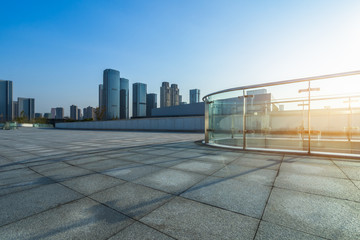 cityscape and skyline of hangzhou in blue sky from empty floor