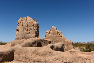 Ancient Small outer building structure and carved wall outside the main building of the Casa Grande Ruins National Monument, Coolidge, AZ