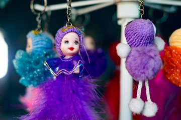 A beautiful doll type key ring is displaying in local fair market of India.