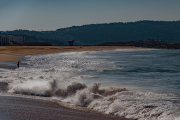Foamy Atlantic waves next to Nazare, Portugal.