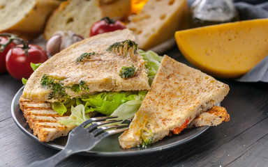 Tasty breakfast. Frittata. Omelette with vegetables and cheese on toast with ice salad. Close-Up