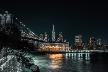 long exposure Side view of Brooklyn Bridge and Jane's Carousel