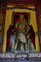Fototapeta premium God statue at ancient temple in Nanning, China