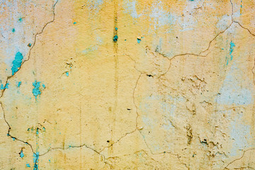 Texture of a concrete wall with cracks and scratches which can be used as a background