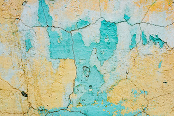 Texture of a concrete wall with cracks and scratches which can be used as a background