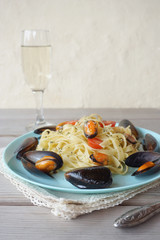 Italian pasta with mussels and tomatoes