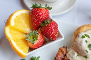 Strawberries and oranges in a fruit cup