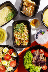 Variety of clean dieting foods in plastic package , top view. Healthy clean food concept.